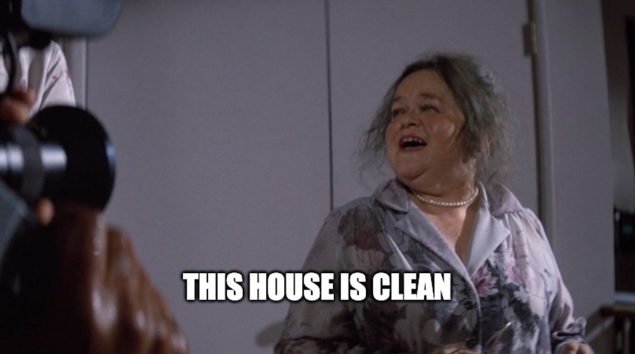 Image of the medium from the movie 'Poltergeist' saying "this house is clean"